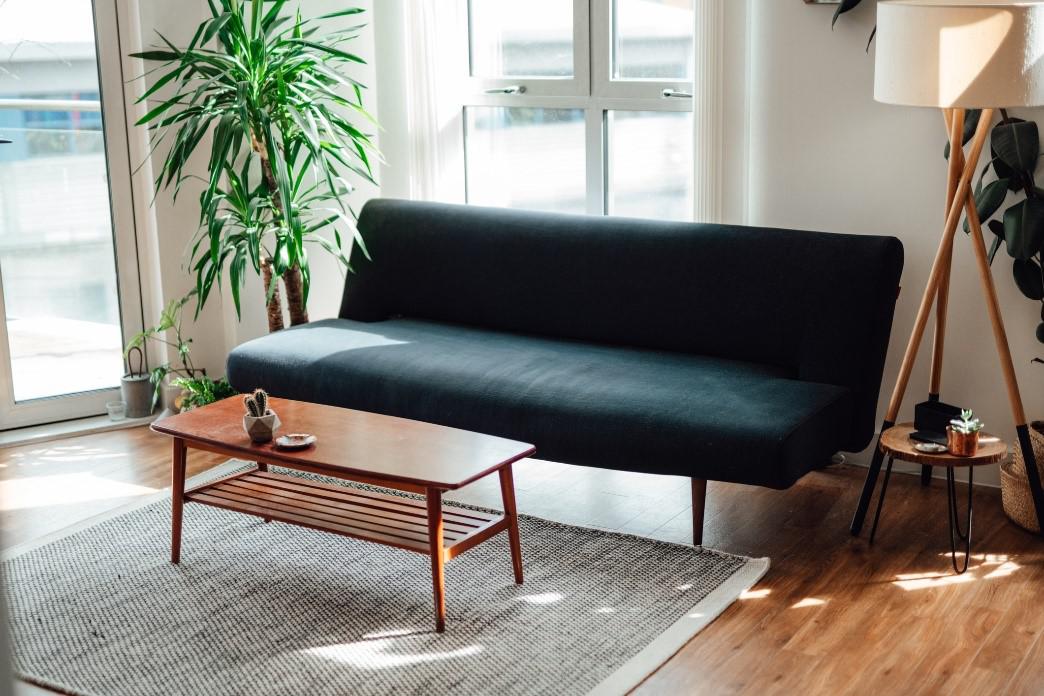 black sofa with wooden table